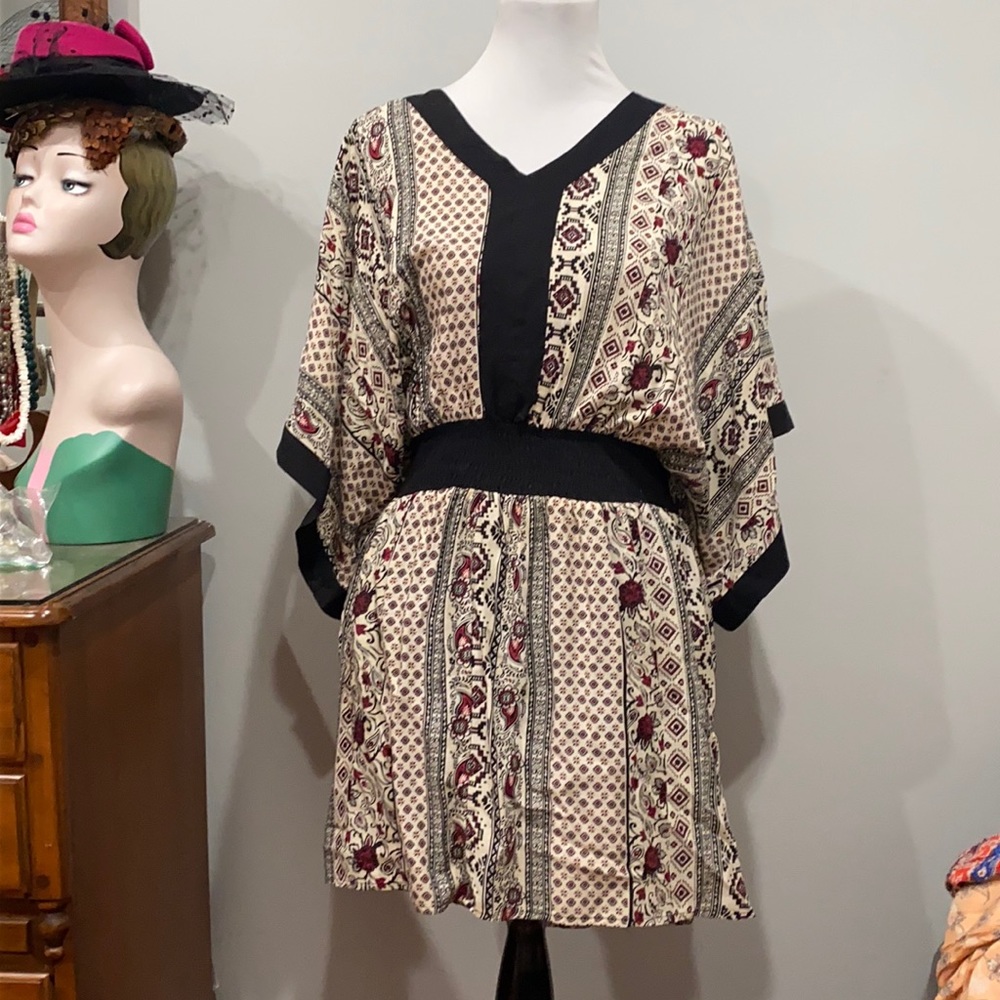 Dress- Kimona style with big sleeves, above knee